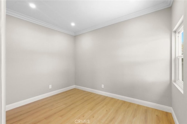 208 W Caldwell St, Compton, CA 90220 - unfurnished room featuring light wood-style floors, ornamental molding, baseboards, and recessed lighting