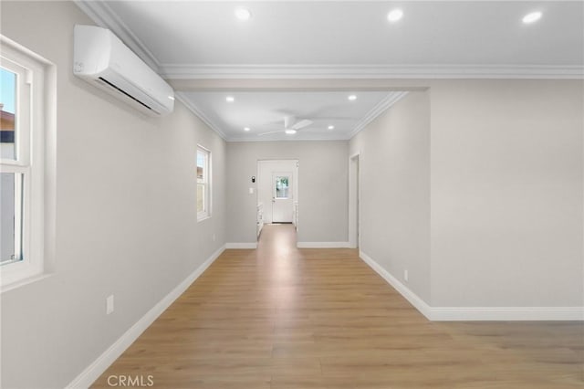 208 W Caldwell St, Compton, CA 90220 - hall with recessed lighting, a wall mounted air conditioner, light wood-style floors, baseboards, and crown molding