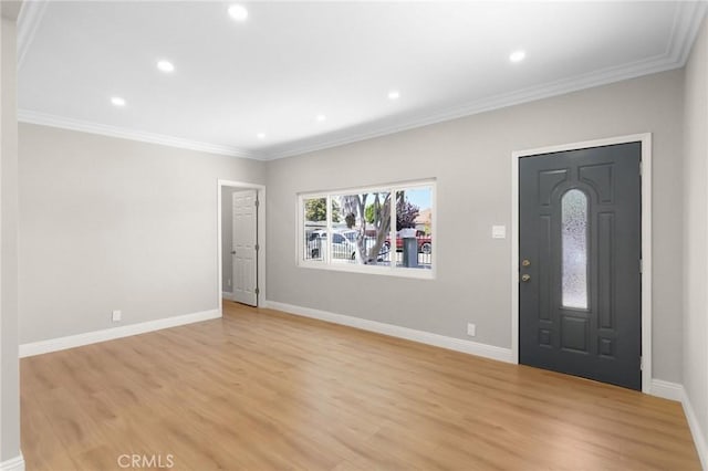 208 W Caldwell St, Compton, CA 90220 - entrance foyer with recessed lighting, light wood-style floors, crown molding, and baseboards