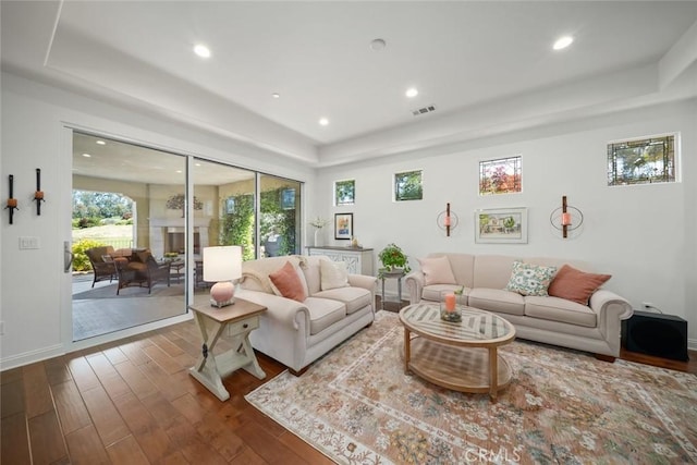 1494 Vista Tesoro Pl, Nipomo, CA 93444 - living room with a raised ceiling, dark wood finished floors, recessed lighting, and baseboards