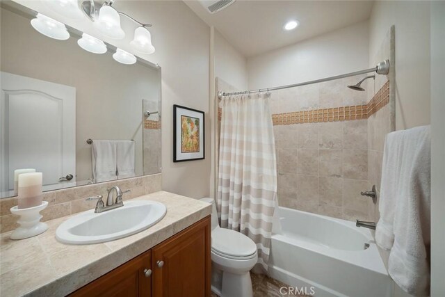 1494 Vista Tesoro Pl, Nipomo, CA 93444 - bathroom with vanity, shower / bathtub combination with curtain, and toilet