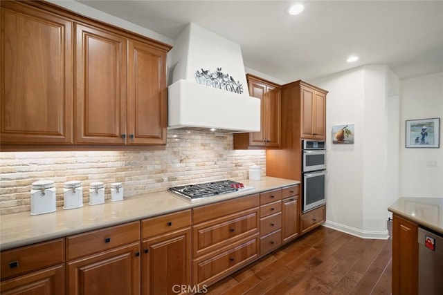 1494 Vista Tesoro Pl, Nipomo, CA 93444 - kitchen with dark wood-style floors, stainless steel appliances, baseboards, brown cabinets, and recessed lighting