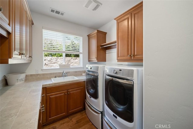 1494 Vista Tesoro Pl, Nipomo, CA 93444 - laundry room with washer and dryer and cabinet space