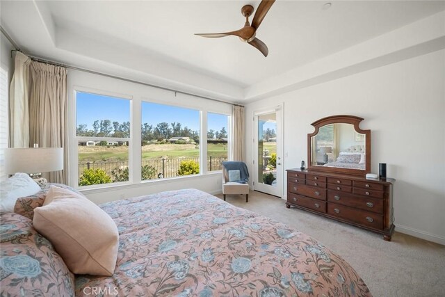 1494 Vista Tesoro Pl, Nipomo, CA 93444 - bedroom with carpet flooring, multiple windows, a tray ceiling, and access to exterior