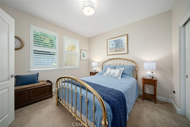 1494 Vista Tesoro Pl, Nipomo, CA 93444 - bedroom with light carpet and baseboards