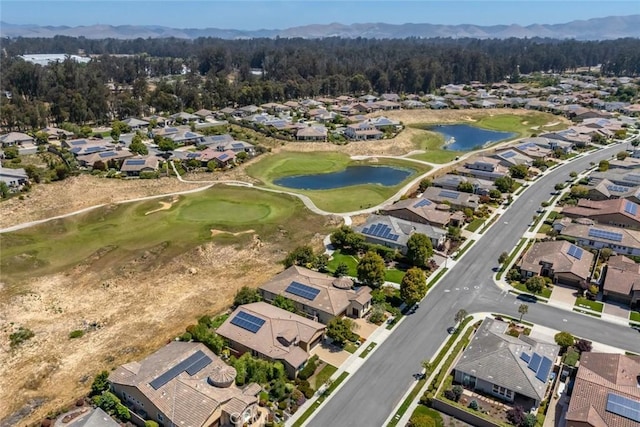 1494 Vista Tesoro Pl, Nipomo, CA 93444 - aerial overview of property's location featuring nearby suburban area, a heavily wooded area, a local golf course, and a water and mountain view