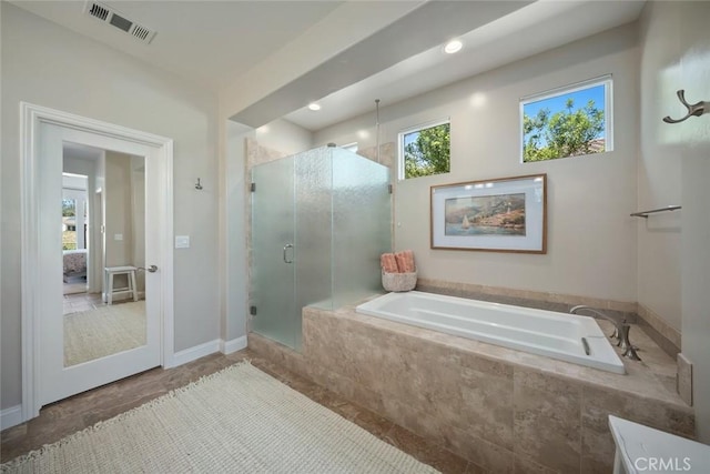 1494 Vista Tesoro Pl, Nipomo, CA 93444 - ensuite bathroom featuring a bath, a shower stall, and baseboards