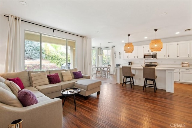 27636 Brentstone Way, Murrieta, CA 92563 - living room with recessed lighting and dark wood-style floors