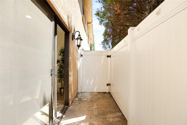 14803 Vanowen St Unit 9, Van Nuys, CA 91405 - view of home's exterior featuring a gate
