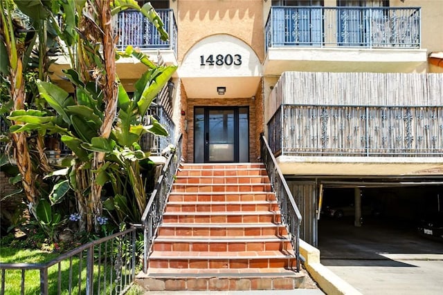 14803 Vanowen St Unit 9, Van Nuys, CA 91405 - property entrance with driveway and a balcony