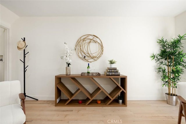 14803 Vanowen St Unit 9, Van Nuys, CA 91405 - wine room with light wood-style flooring and baseboards