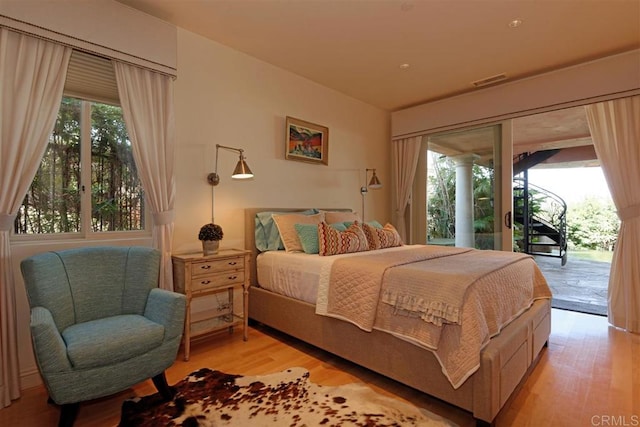 741 Rosecrans, San Diego, CA 92106 - bedroom with access to exterior and light wood-style flooring