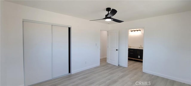 3355 Debbie Ln, Riverside, CA 92501 - unfurnished bedroom featuring light wood-style flooring, a closet, and a ceiling fan
