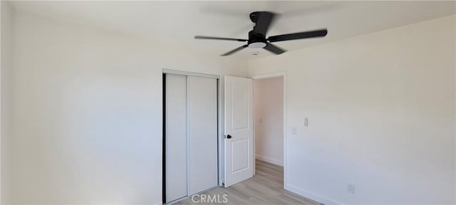 3355 Debbie Ln, Riverside, CA 92501 - unfurnished bedroom with light wood-style flooring, a closet, baseboards, and ceiling fan