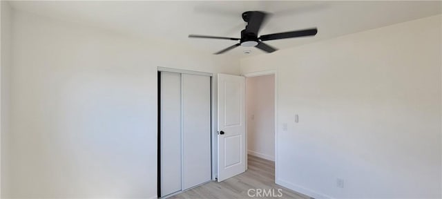 3355 Debbie Ln, Riverside, CA 92501 - unfurnished bedroom featuring light wood-style flooring, a closet, and ceiling fan
