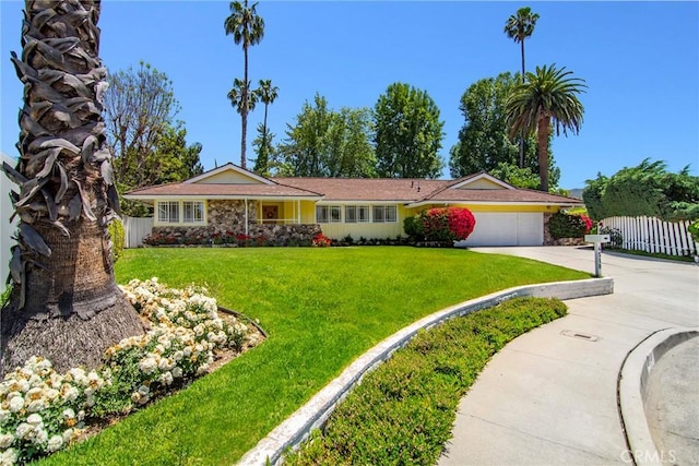 4510 Triste Pl, Tarzana, CA 91356 - ranch-style home with driveway and a garage
