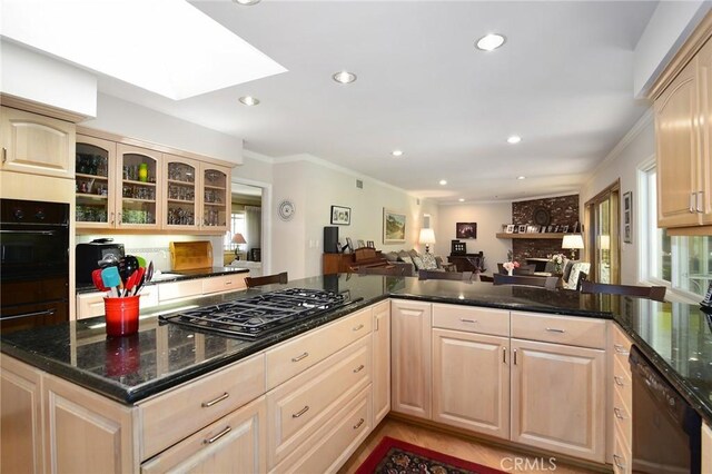 4510 Triste Pl, Tarzana, CA 91356 - kitchen with black appliances, light brown cabinets, crown molding, open floor plan, and recessed lighting