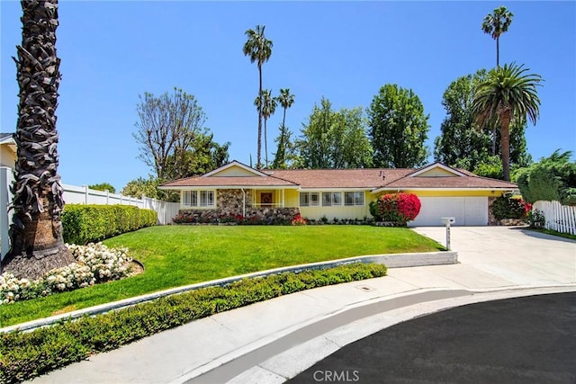 4510 Triste Pl, Tarzana, CA 91356 - ranch-style home featuring a garage and concrete driveway