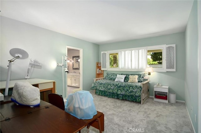 4510 Triste Pl, Tarzana, CA 91356 - carpeted bedroom featuring a desk, baseboards, and connected bathroom