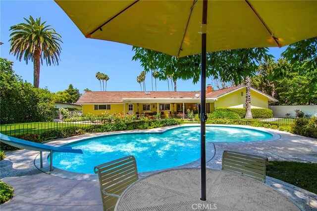 4510 Triste Pl, Tarzana, CA 91356 - view of swimming pool featuring a water slide and a patio area