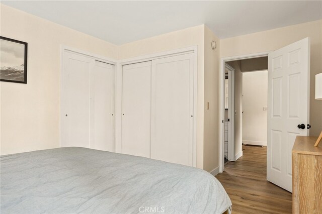 217 Crest Cir, Lake Arrowhead, CA 92352 - bedroom with wood finished floors and baseboards