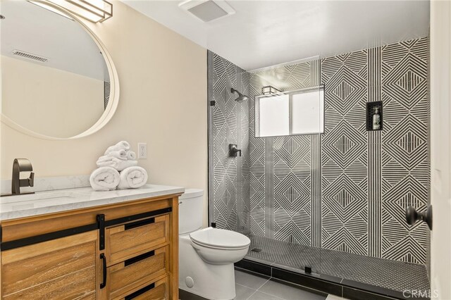 217 Crest Cir, Lake Arrowhead, CA 92352 - full bath with toilet, vanity, a shower, and tile patterned flooring