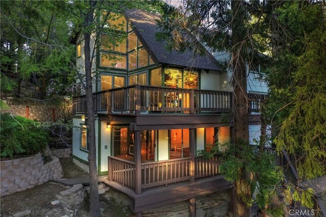217 Crest Cir, Lake Arrowhead, CA 92352 - back of property featuring roof with shingles