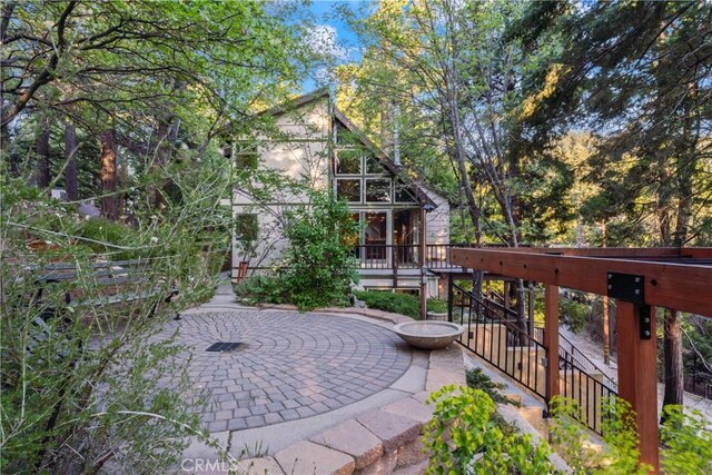 217 Crest Cir, Lake Arrowhead, CA 92352 - view of patio featuring stairs