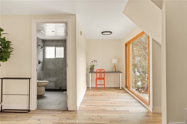 217 Crest Cir, Lake Arrowhead, CA 92352 - corridor featuring wood finished floors and baseboards