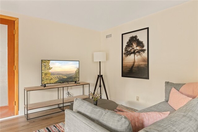 217 Crest Cir, Lake Arrowhead, CA 92352 - living room featuring wood finished floors and baseboards