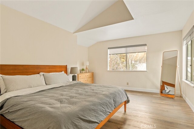 217 Crest Cir, Lake Arrowhead, CA 92352 - bedroom featuring light wood-type flooring, vaulted ceiling, and baseboards