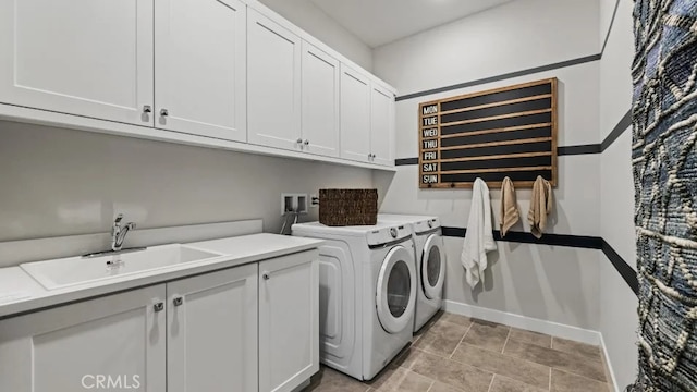 27225 Cranmore Way Unit 302, Valencia, CA 91381 - washroom with cabinet space, independent washer and dryer, and baseboards