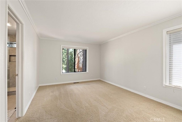 720 E Mountain Ridge Rd, Lake Almanor, CA 96137 - empty room featuring light carpet, ornamental molding, and baseboards
