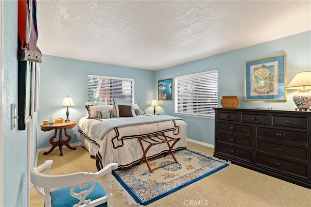 720 E Mountain Ridge Rd, Lake Almanor, CA 96137 - carpeted bedroom with a textured ceiling and baseboards