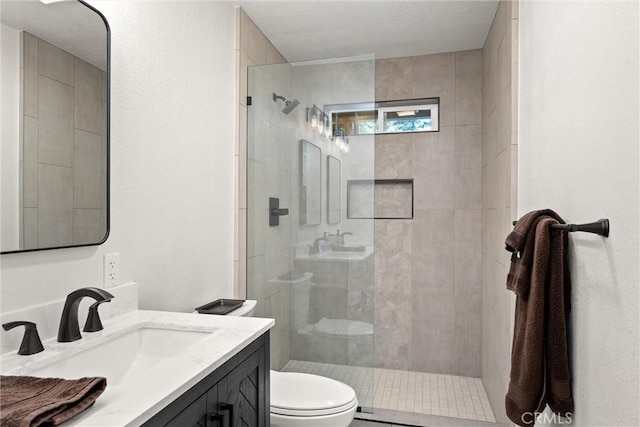720 E Mountain Ridge Rd, Lake Almanor, CA 96137 - bathroom with toilet, tiled shower, and vanity