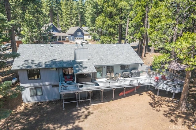 720 E Mountain Ridge Rd, Lake Almanor, CA 96137 - back of house with a wooden deck and roof with shingles
