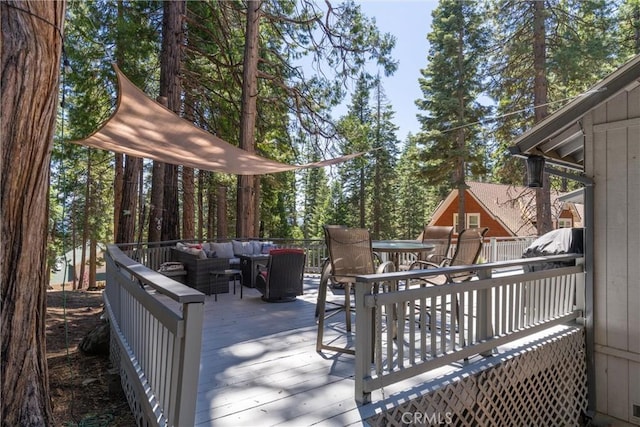 720 E Mountain Ridge Rd, Lake Almanor, CA 96137 - wooden terrace with outdoor lounge area and grilling area