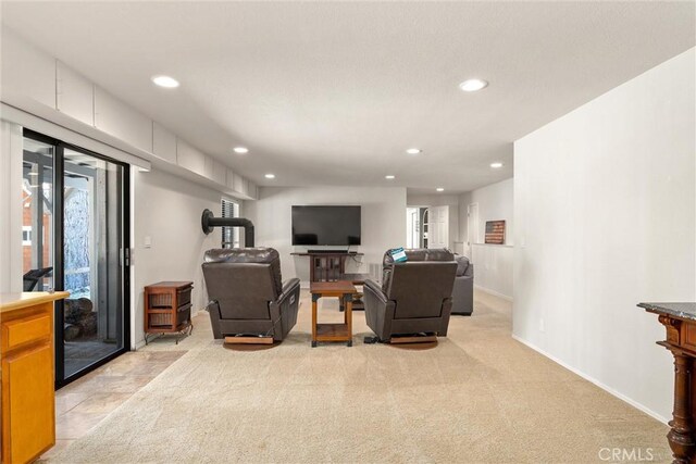 720 E Mountain Ridge Rd, Lake Almanor, CA 96137 - living area with recessed lighting, healthy amount of natural light, baseboards, and light carpet