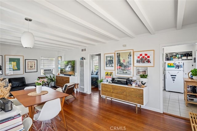 295 Wave St, Laguna Beach, CA 92651 - dining space featuring beamed ceiling and wood finished floors