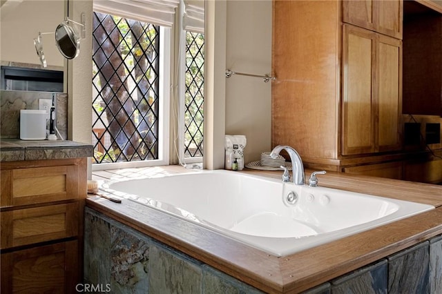 951 Osprey Ln, Lake Arrowhead, CA 92352 - bathroom featuring a garden tub and vanity