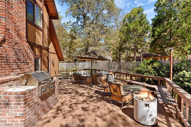 951 Osprey Ln, Lake Arrowhead, CA 92352 - wooden terrace featuring an outdoor fire pit and outdoor dining space