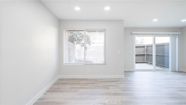 12302 Runnymede St Unit 4, North Hollywood, CA 91605 - spare room featuring recessed lighting, baseboards, and light wood finished floors