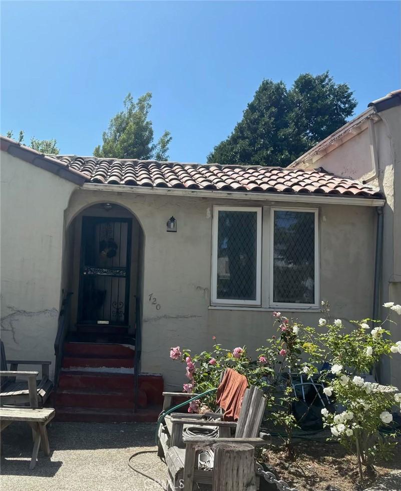 720 Ky Route Blvd, Albany, CA 94706 - doorway to property with a tile roof and stucco siding