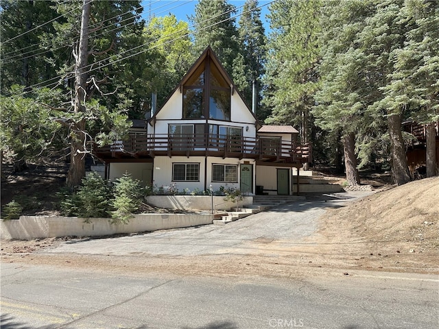1928 Wilderness Rd, Running Springs, CA 92382 - view of front of home with a balcony