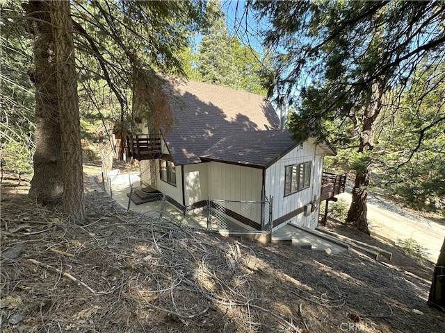 1928 Wilderness Rd, Running Springs, CA 92382 - view of property exterior with roof with shingles