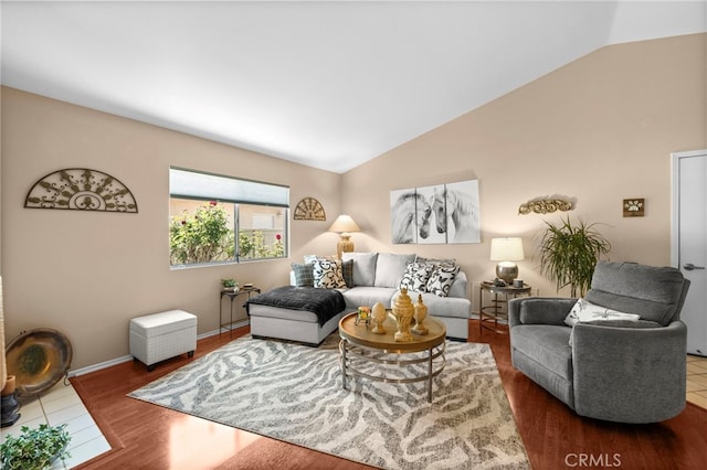 23981 Via Astuto, Murrieta, CA 92562 - living area with vaulted ceiling, wood finished floors, and baseboards