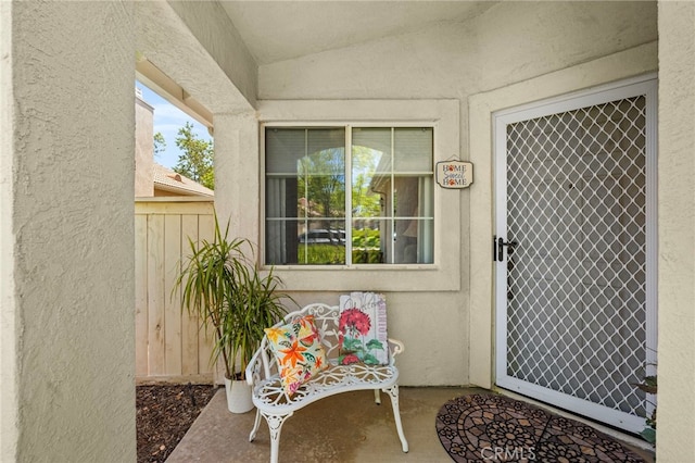 23981 Via Astuto, Murrieta, CA 92562 - doorway to property with stucco siding