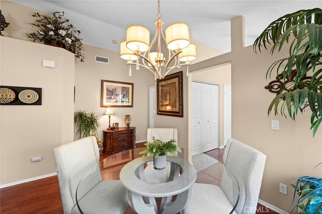 23981 Via Astuto, Murrieta, CA 92562 - dining space featuring a chandelier, baseboards, and wood finished floors