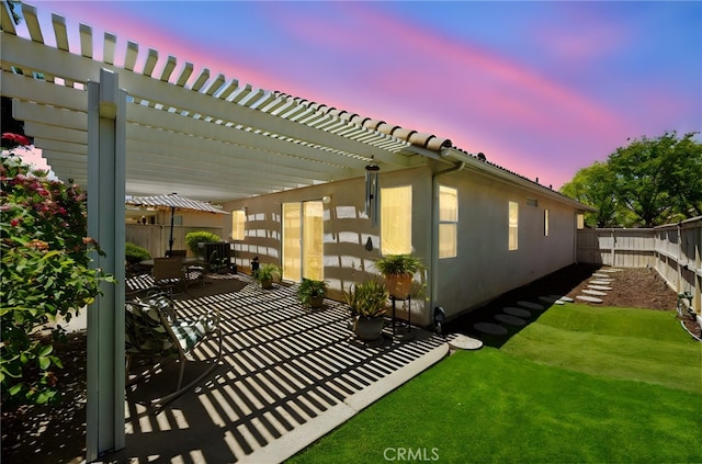 23981 Via Astuto, Murrieta, CA 92562 - patio terrace at dusk with a pergola and a patio