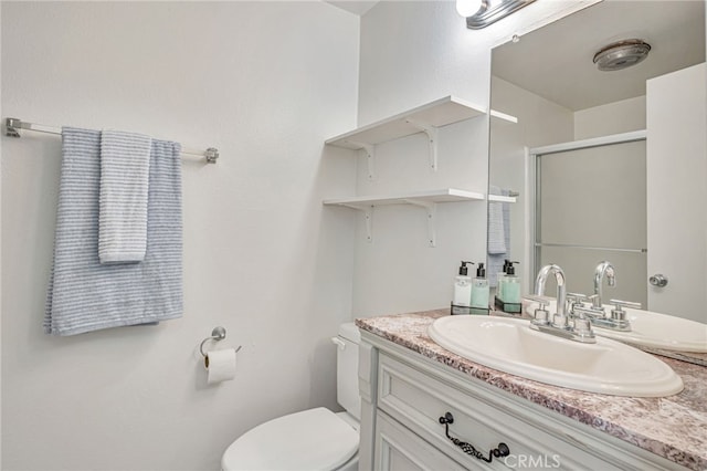 18645 Hatteras St Unit 203, Tarzana, CA 91356 - bathroom with vanity, toilet, and an enclosed shower